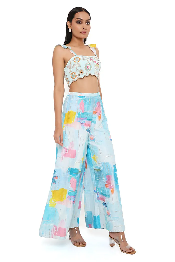 AQUA GEORGETTE EMBROIDERED BUSTIER WITH PAINTERLY DUPION SILK PRINTED EMBROIDERED PALAZZO