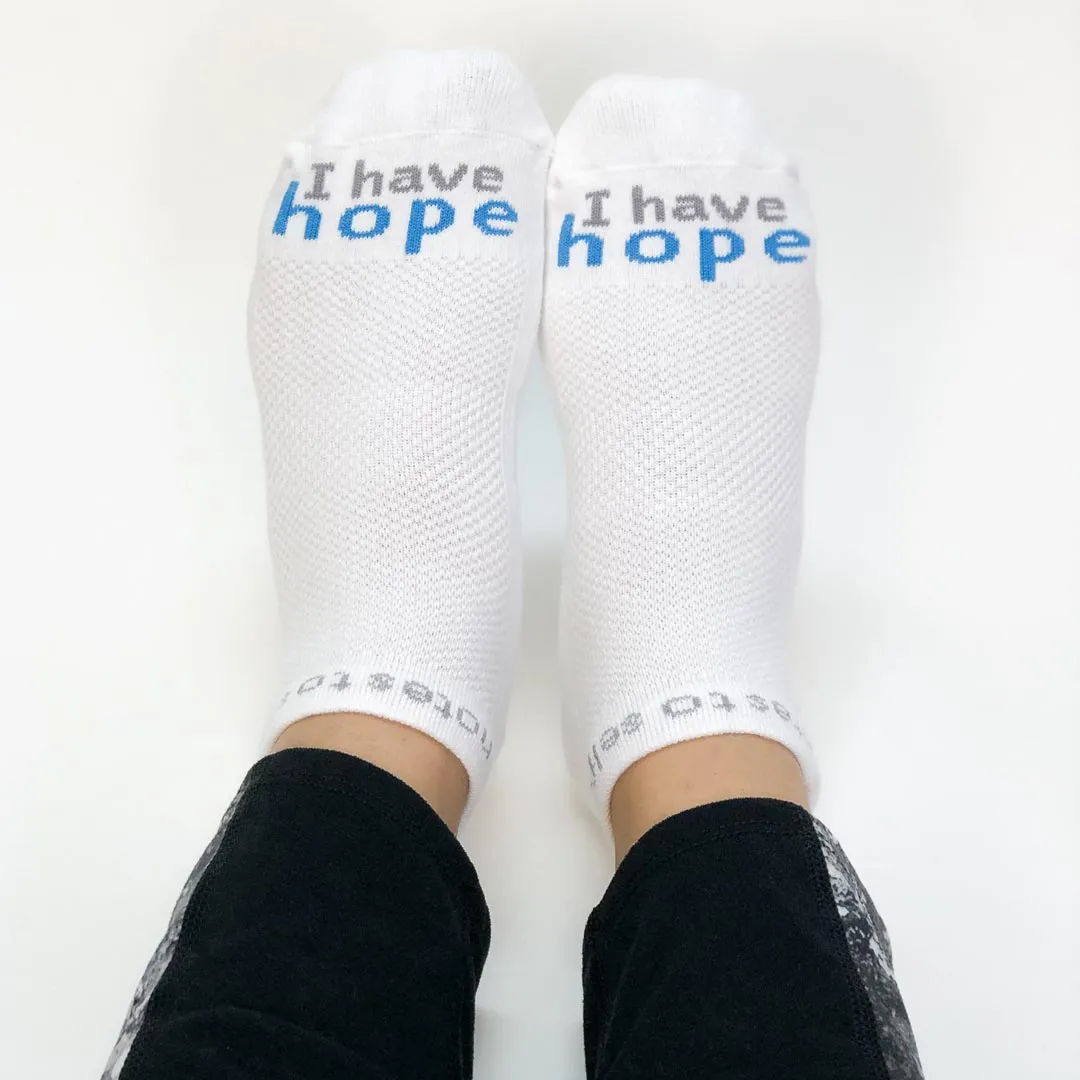 I have hope® white low-cut socks with blue words