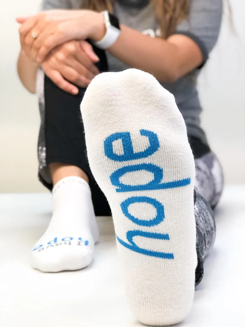 I have hope® white low-cut socks with blue words
