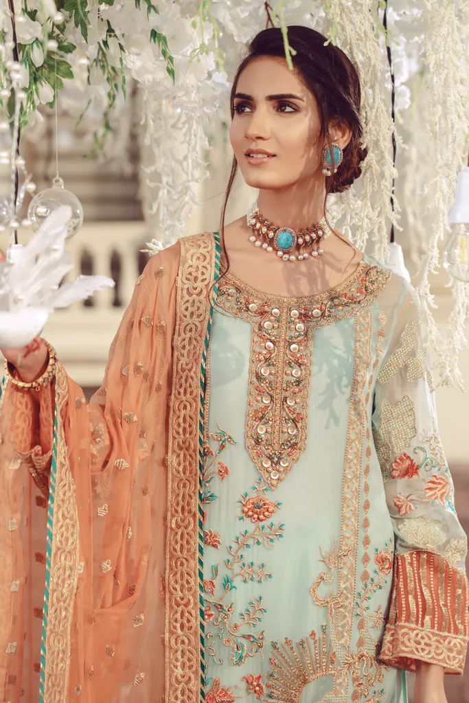 Pakistani embroidered formal eid outfit in green and peach color # P2497