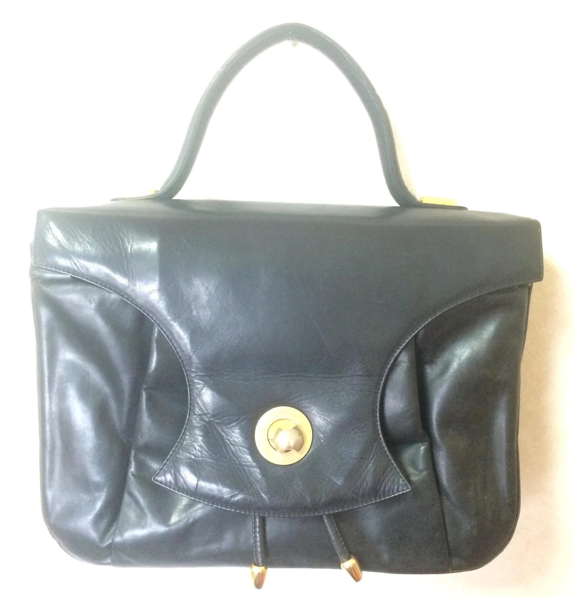 Vintage Bally black leather retro pop design bag, business purse with gold tone drawstrings and unique flap cut design.  Unisex use. 160315