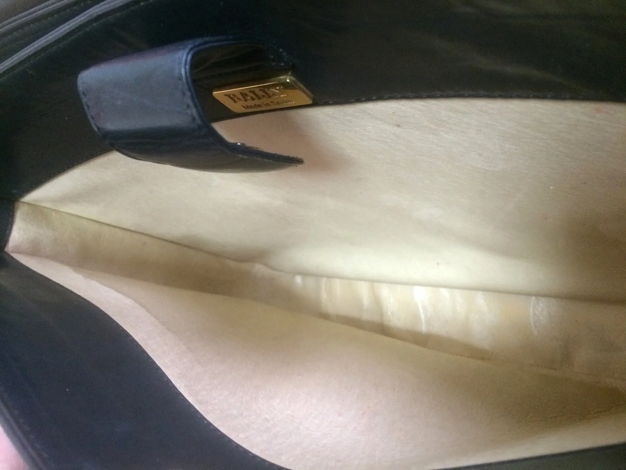 Vintage Bally black leather retro pop design bag, business purse with gold tone drawstrings and unique flap cut design.  Unisex use. 160315