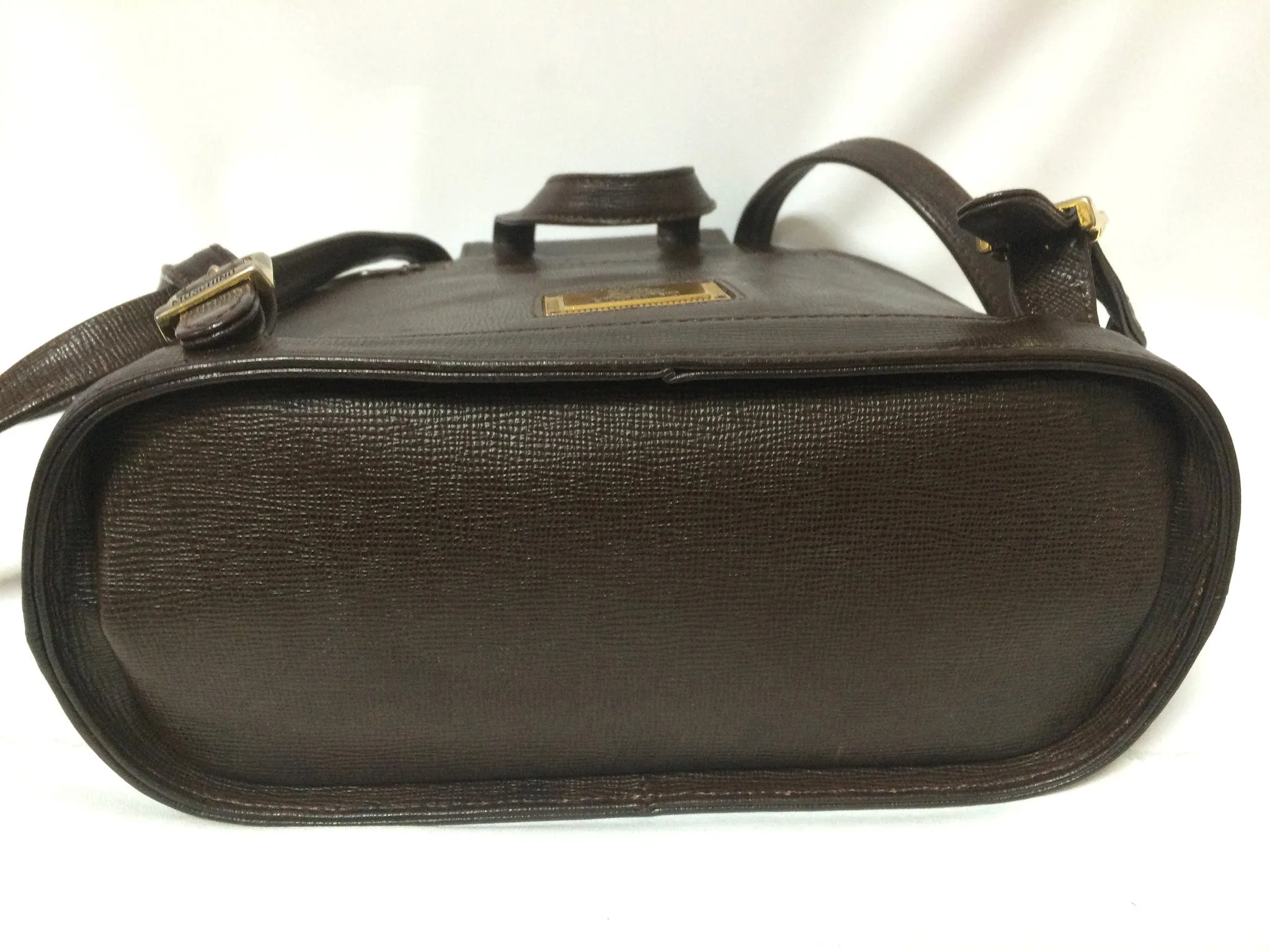 Vintage MOSCHINO genuine dark brown leather backpack with golden and black M logo motif from cheap and chic by moschino. Perfect daily bag. 060528r1