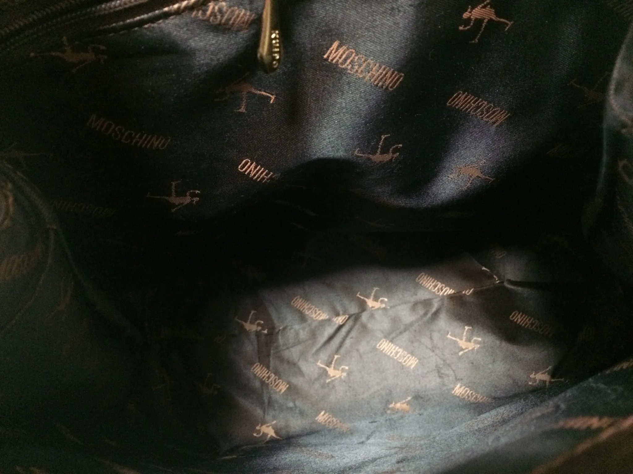 Vintage MOSCHINO genuine dark brown leather backpack with golden and black M logo motif from cheap and chic by moschino. Perfect daily bag. 060528r1