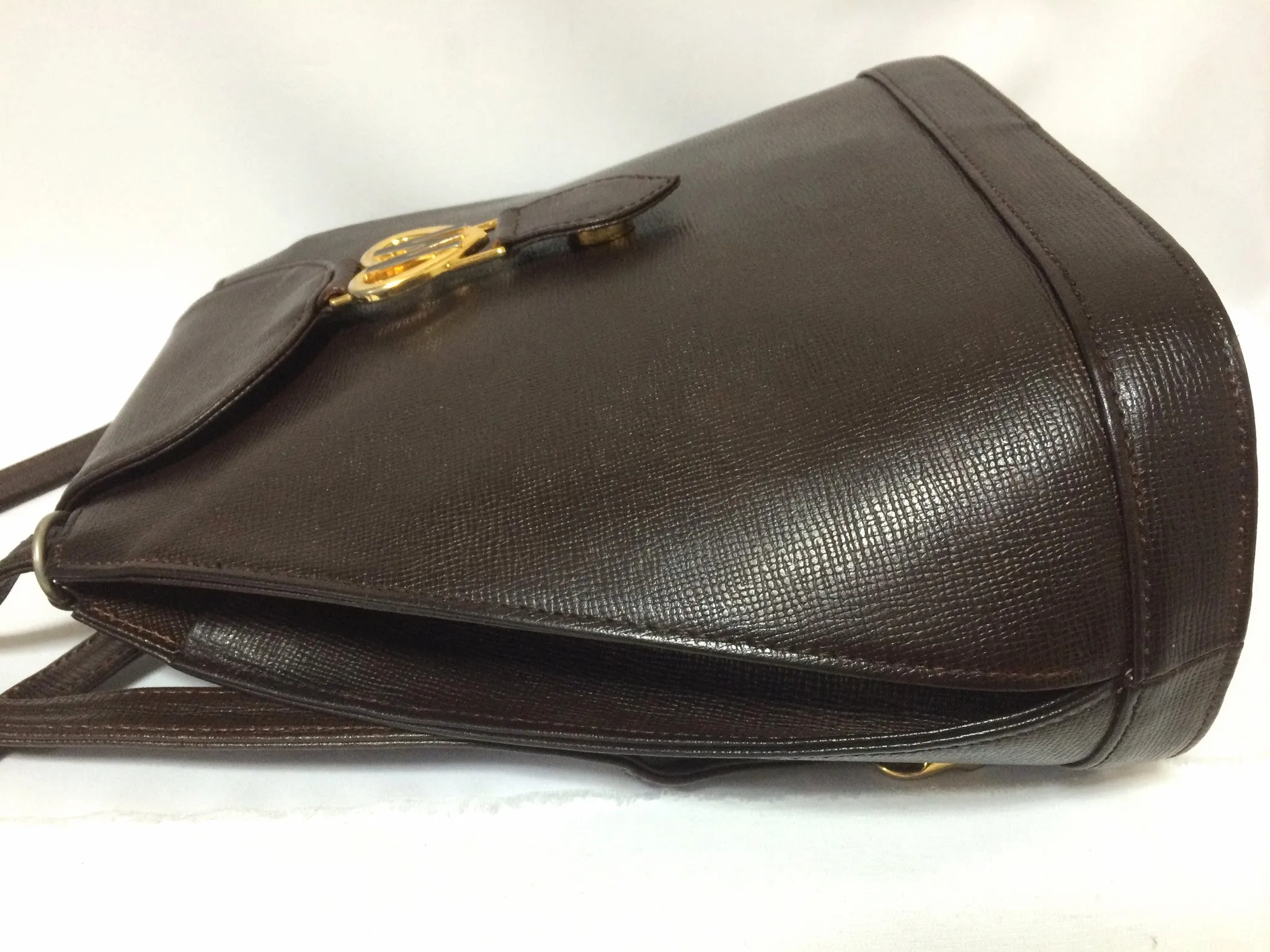 Vintage MOSCHINO genuine dark brown leather backpack with golden and black M logo motif from cheap and chic by moschino. Perfect daily bag. 060528r1